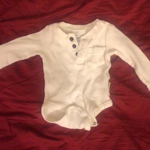 Plain white long sleeve onsie. Great for layering